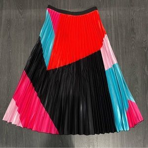 Multi color pleated skirt. Multiple Sizes. Brand New. Stretch Material.